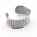 Load image into Gallery viewer, Silver open cuff bracelet with embedded stones on a white background