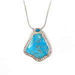 Load image into Gallery viewer, Australian Rough Turquoise Pendant set in Hammered Silver with Turquoise Cabochon.
