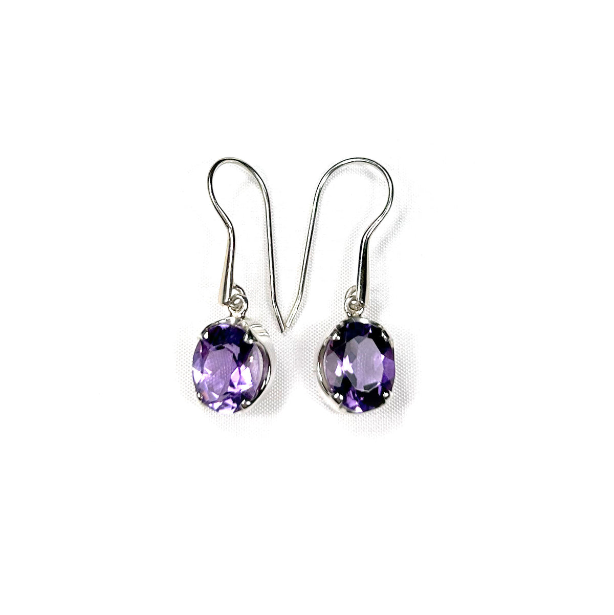 Amethyst oval gemstone earrings in silver