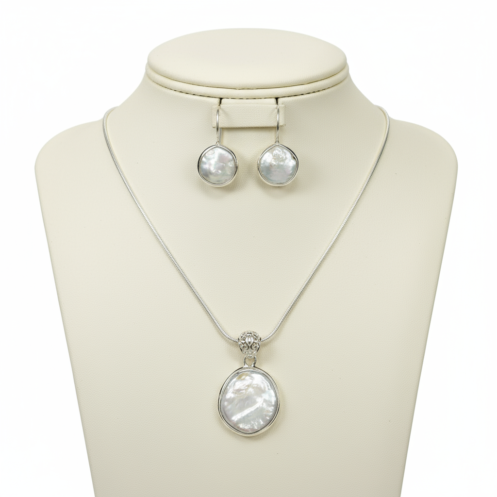 Coin pearl earring and pendant set in sterling silver