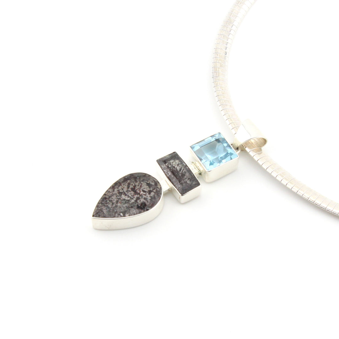 Multi Stone Pendant With Lepidocrosite In Quartz And Topaz