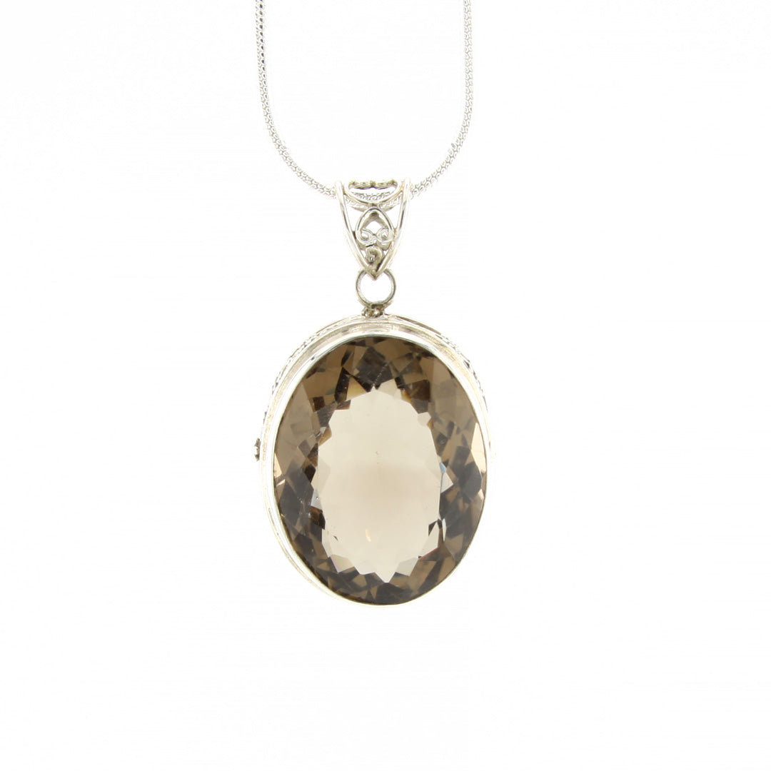 Smokey Quartz Gemstone Pendant With Silver Detail