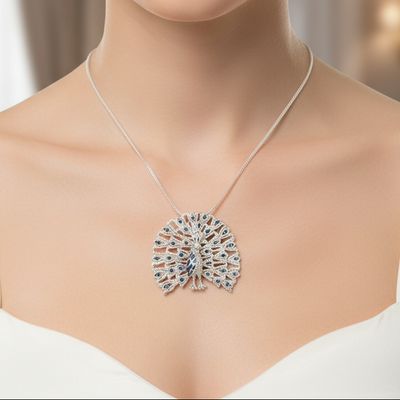Necklace with a peacock feather pendant on a mannequin